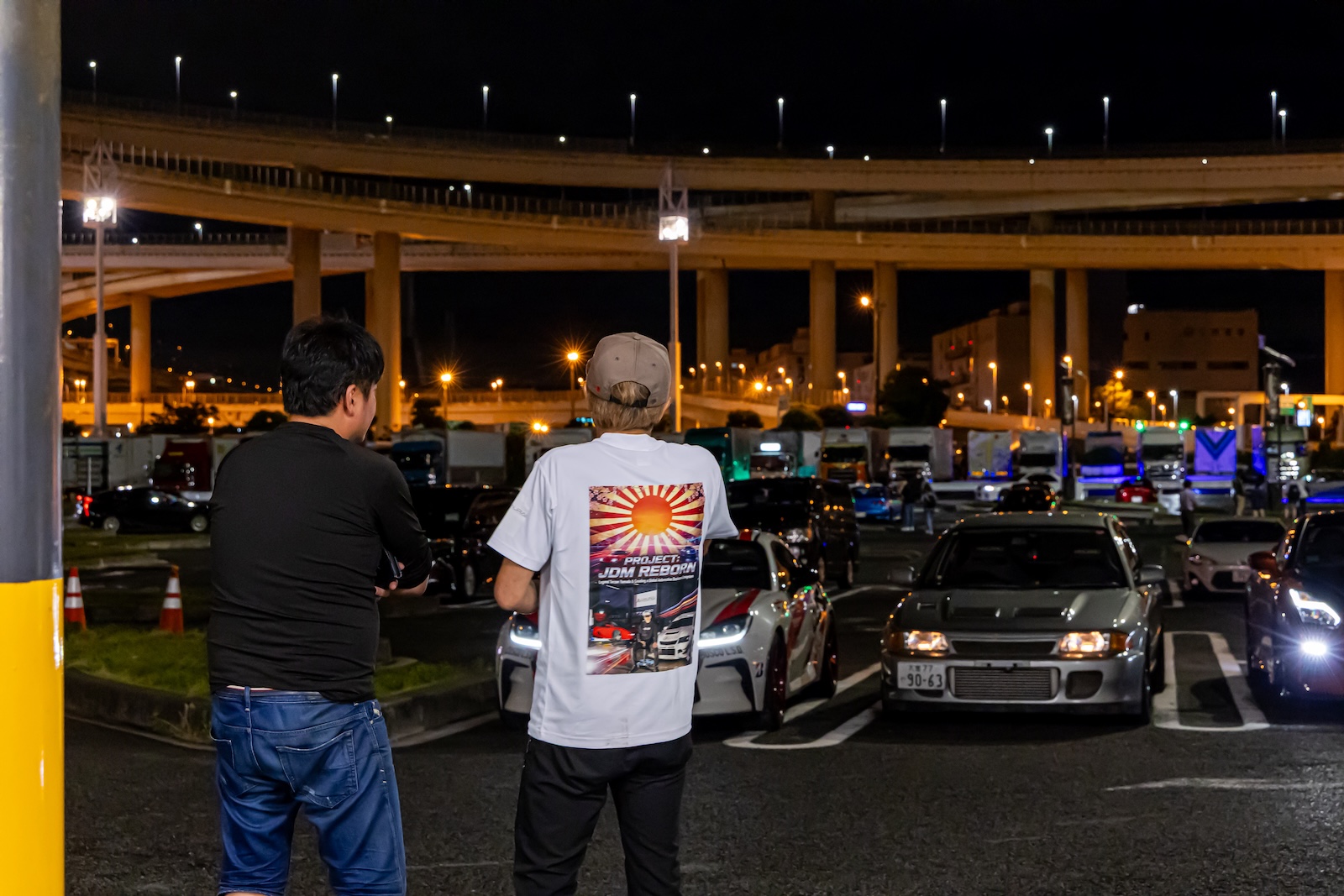 Tarzan Yamada with guests on a JDM tour